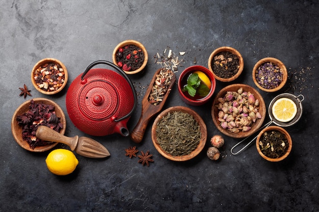 Various dried tea and teapot