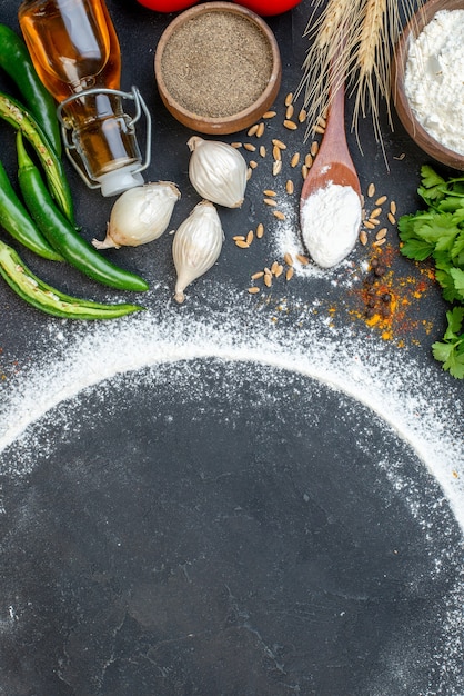 various fresh foods and copy space with flour around