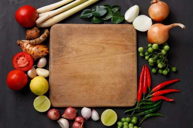 Various herbs, spices and Ingredients on dark. Top view