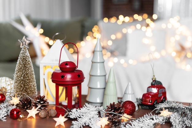 Various home christmas or new year decorations composition at coffee table