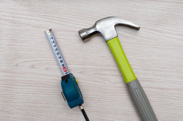 Various household tools such as hammer and tape measure screwdriver