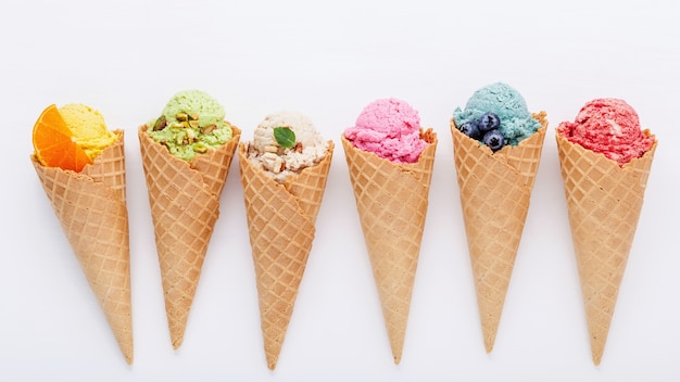 Various of ice cream flavor in cones setup on white background for sweets menu design.