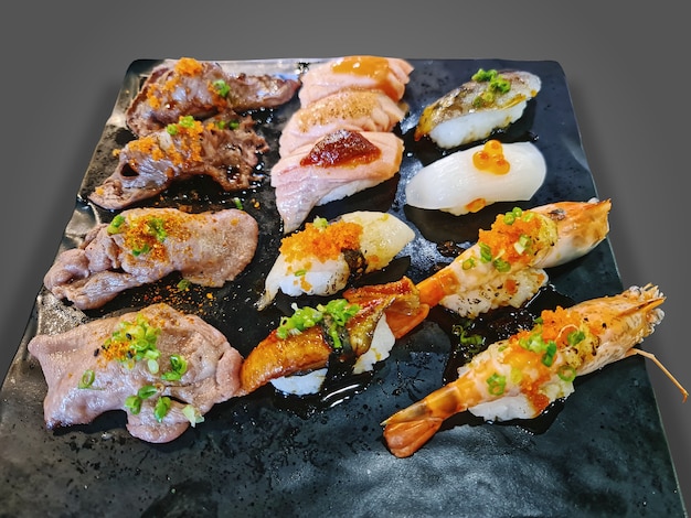 Various Kinds of Sushi Set with Beef Shrimp Salmon and Squid