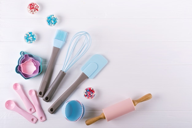 Various kitchen baking utensils. Flat lay. Top view, mockup for recipe on white background.