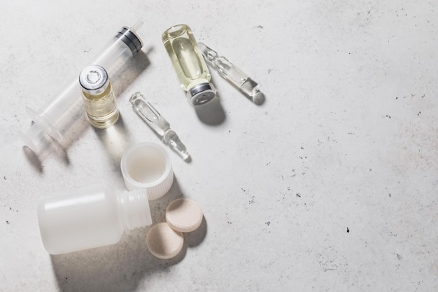 Various medicines on the table with copy space on the right side of the frame