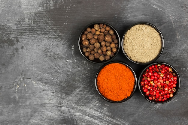 Various pepper on a black background