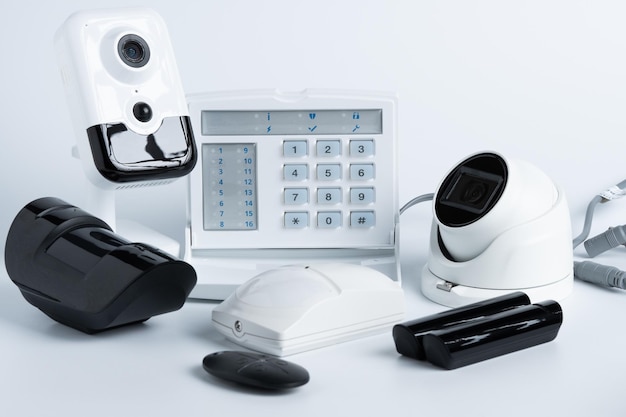 Various security system equipment on white background