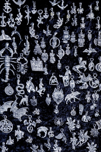 Various silver pendants animals zodiac signs