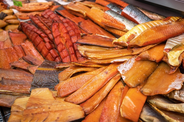 Various smoked fish products healthy eating and fish market concept