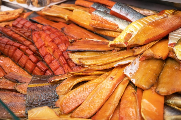 Various smoked fish products healthy eating and fish market concept