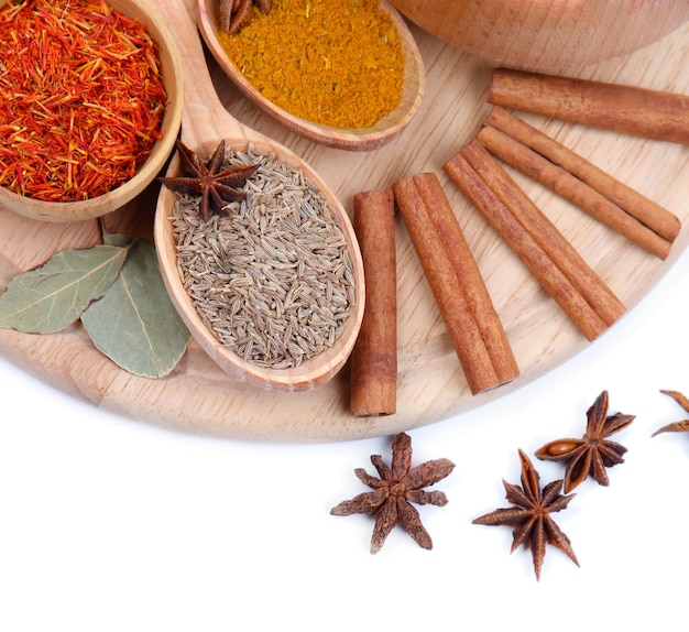 Various spices and herbs isolated on white