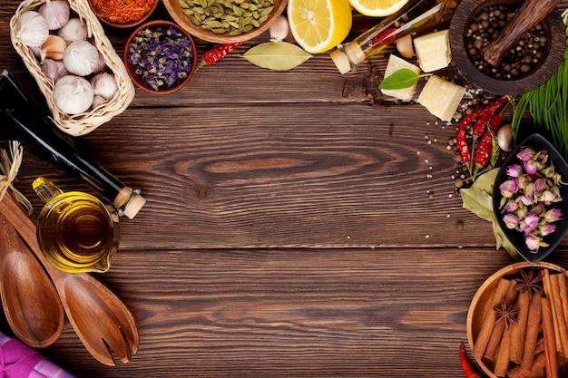 Various spices on wooden background