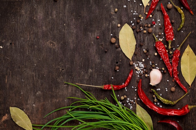 Various spices on wooden background