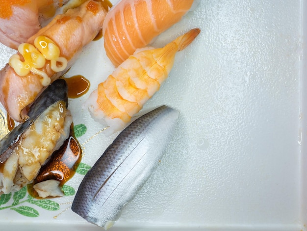 Various sushi or Japanese food on white background.