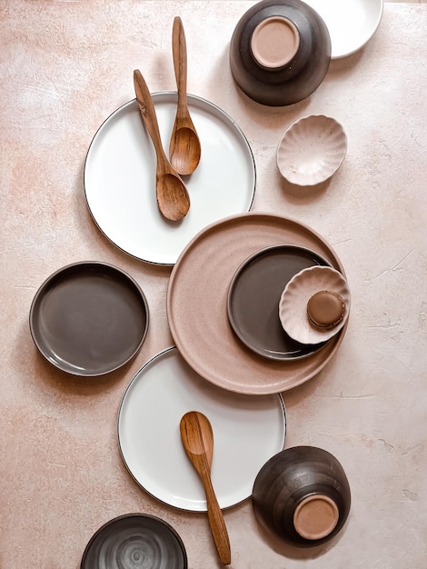 Various of tabble ware, plate, bowl and wooden spoon. Top view angle