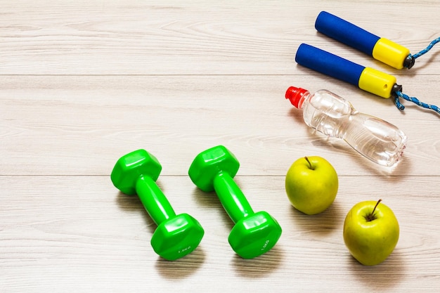 Various tools for fitness on floor in room