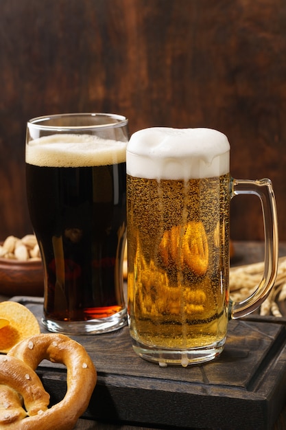 Various types of freshly poured beer - light and dark and snack variety.