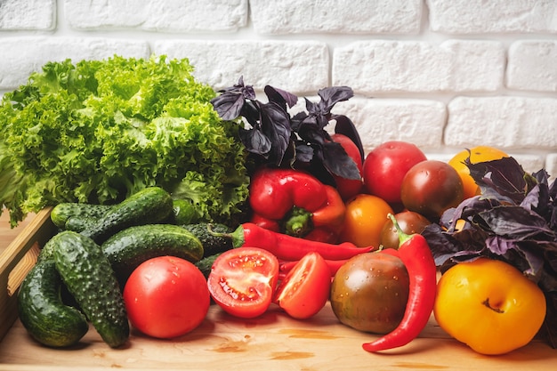 Various vegetables and salad leaves.