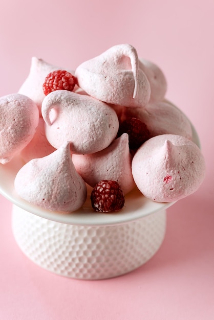 Vase Full of Homemade Raspberry Merengues Pink Background Above