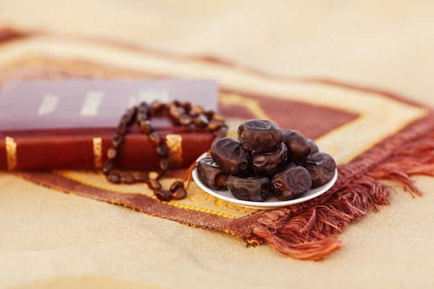  Вates and rosaries, beautifully laid out on the prayer rug in the desert.