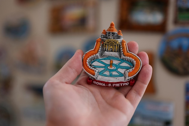 Vatican souvenir refrigerator magnet at hand