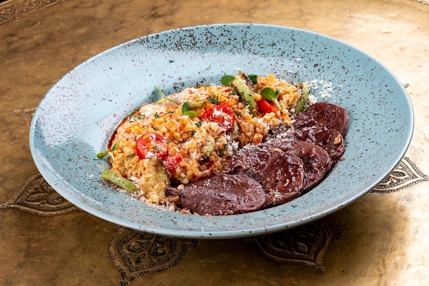 Veal tongues stewed with bulgur Classic retro Russian dish