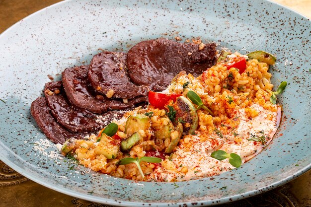 Veal tongues stewed with bulgur Classic retro Russian dish