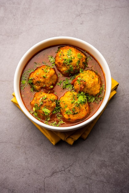 Veg Kofta Curry is an exotic Indian gravy dish made from mix vegetable dumplings dunked in a onion-tomato based gravy