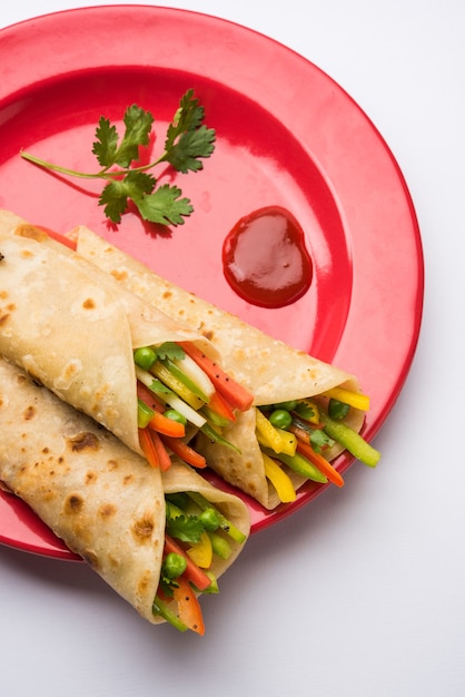 Veg Spring Roll OR Wrap also known as Franky, made using Paneer and Vegetables stuffed inside Chapati or Roti. Served with Tomato Ketchup. Selective focus