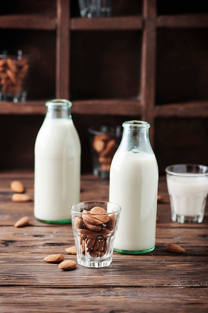 Photo vegan almond milk on the vintage table