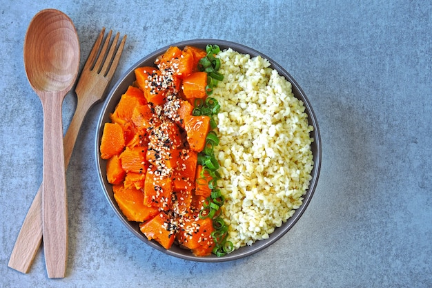 Vegan bowl with bulgur and pumpkin. Healthy tasty food. The concept of proper nutrition.