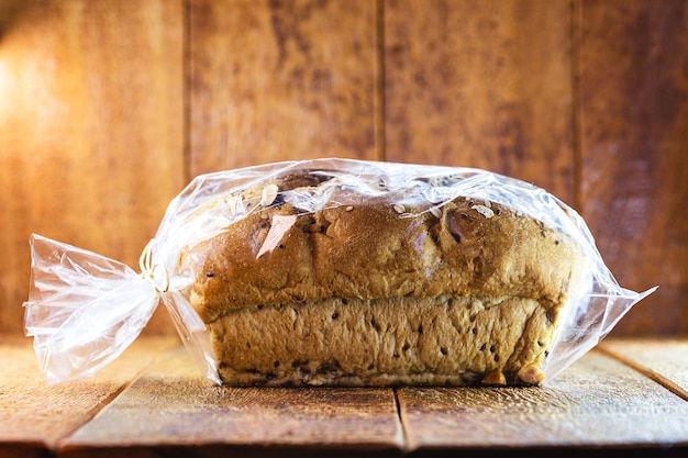 vegan bread made with grains packed in plastic bag, handmade product for sale