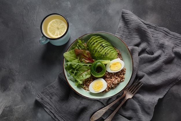 Vegan Buddha bowl with buckwheat, avocado