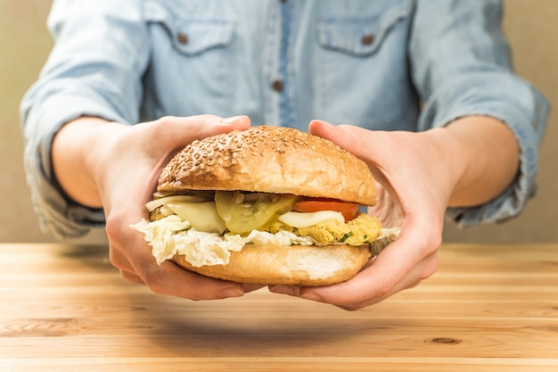 Vegan burger in hands