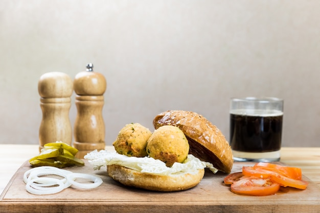 Vegan burger ingredients on wood table