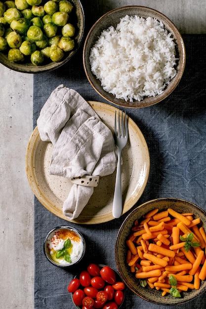 Vegan dinner table with rice and vegetables