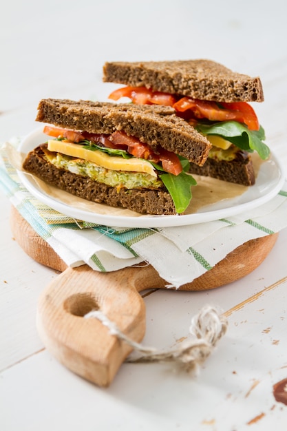 Vegan sandwich with salad and cheese