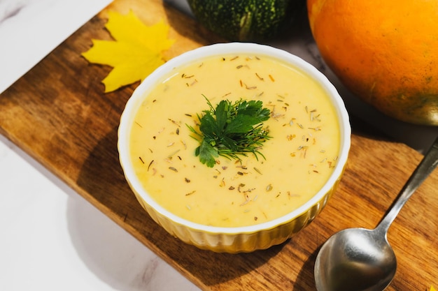 Vegetable cream soup with pumpkin and herbs