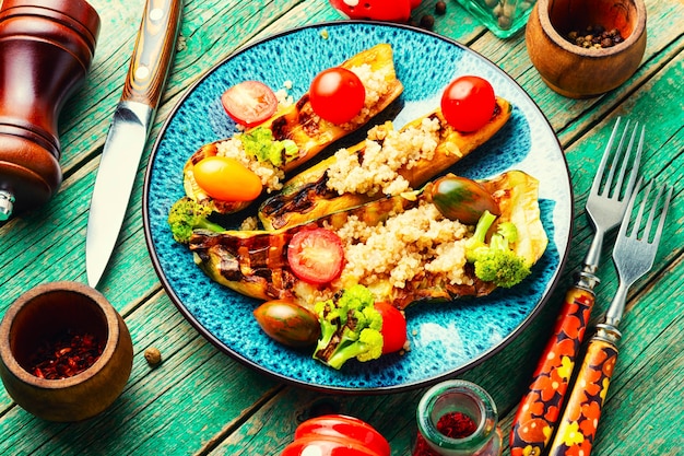 Vegetable food with grilled zucchini,broccoli,tomato and quinoa.Vegan food