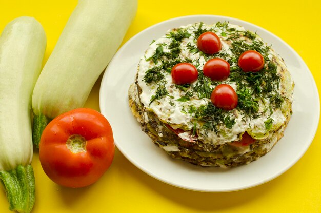 Vegetable pie made of zucchini and tomatoes