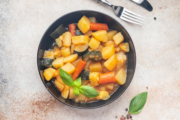 vegetable ragout stew potatoe, carrot, zucchini fresh dish healthy meal food snack on the table