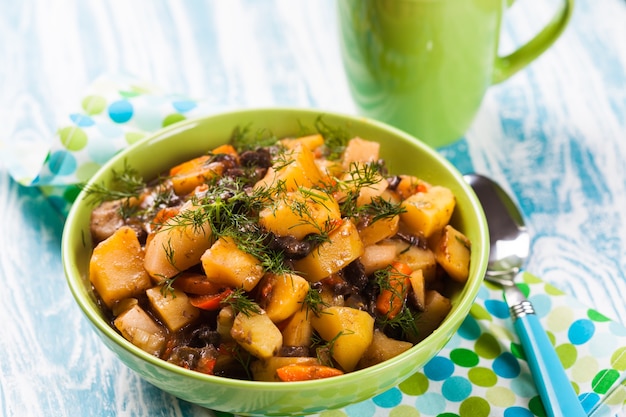 Vegetable ragout with mushrooms in a bowl