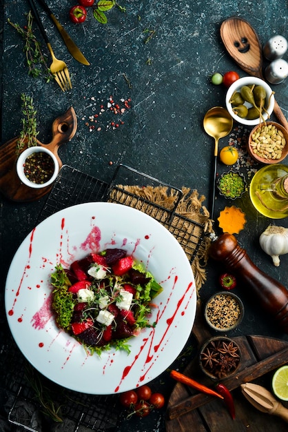 Vegetable salad with beets and feta cheese Healthy food Top view Rustic style