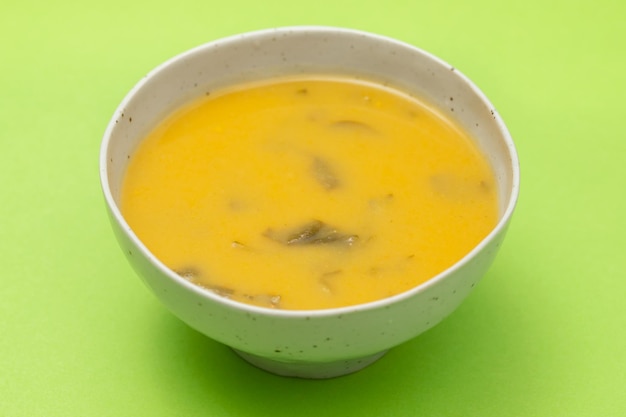 Vegetable soup with spinach in the bowl