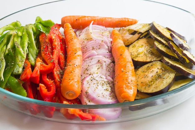 Vegetable tray for baking Onion pepper red and green carrot and eggplant