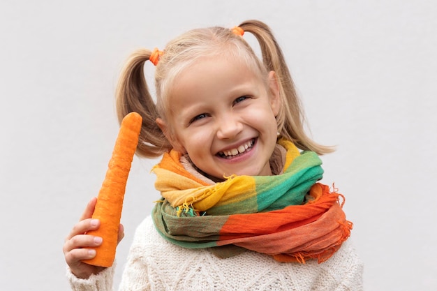 Vegetables for Children. Fresh Carrot are Good Food for Child. Happy Kid Eating Fresh Vegetable.