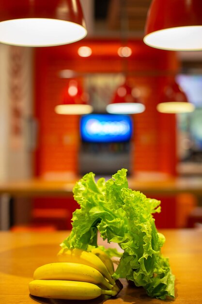 Vegetables and fruits against the background of a blurred kitchen