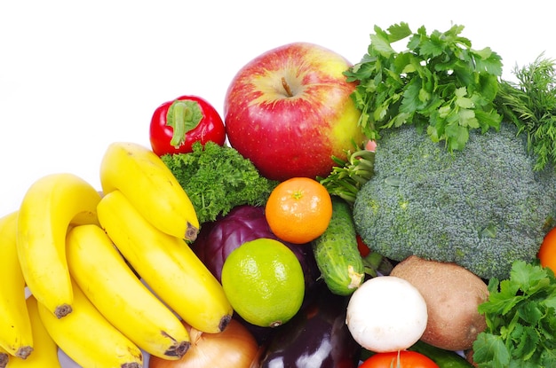 Vegetables and fruits on white