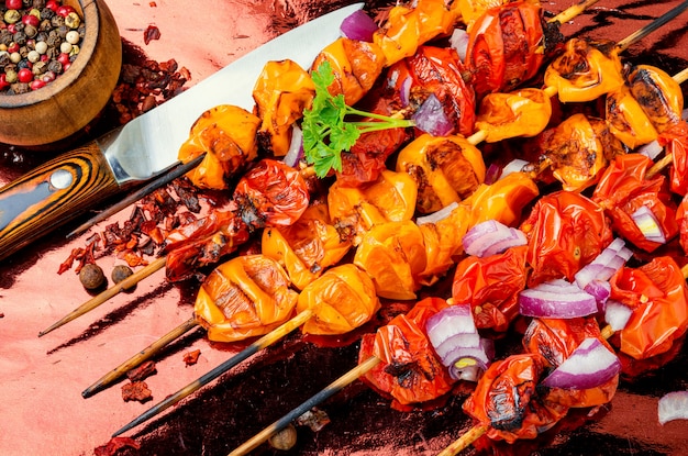 Vegetables for grilling.Vegetable skewers of tomatoes, cherry tomatoes on skewers.