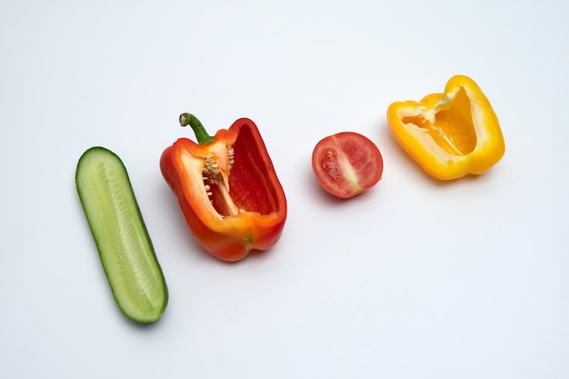 Vegetables in the section on a white background